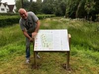 Orchard Graphic Being Installed By Andy Green